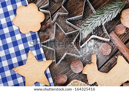 molds and ingredients for baking Christmas cookies