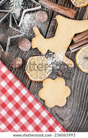 Christmas cookies and different ingredients for baking