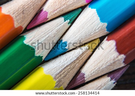 Colored pencils. Very shallow depth of field. Focus on blue pencil leads