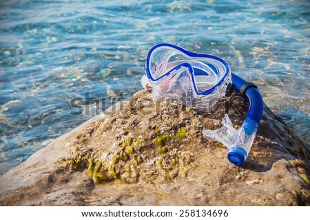mask for scuba diving and snorkel to swim at the beach. Focus on the mask