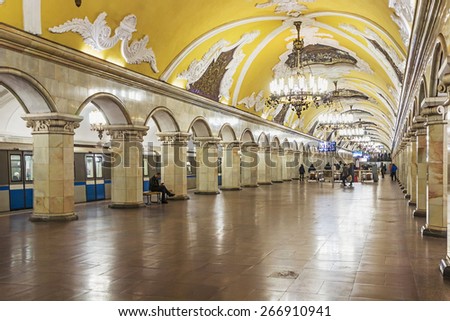 MOSCOW, RUSSIA - April 3, 2015: Tourists at the metro station Komsomolskaya in Moscow, Russia. Metro station Komsomolskaya is a monument of the Soviet era.