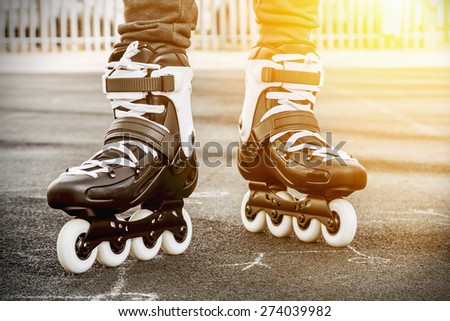 walk on roller skates for skating. Focus on roller skates.