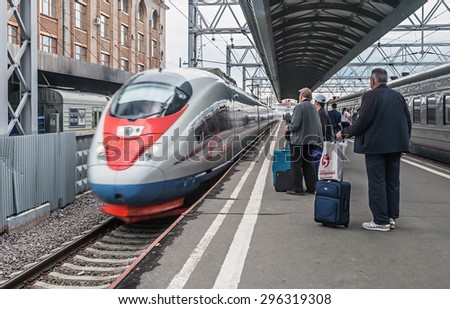 ST PETERSBURG, RUSSIA - July 8, 2015: Passengers boarding the train sapsan at the Moscow station. \