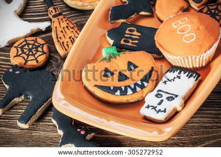 happy Halloween homemade cookies. Focus on the pumpkin cookies