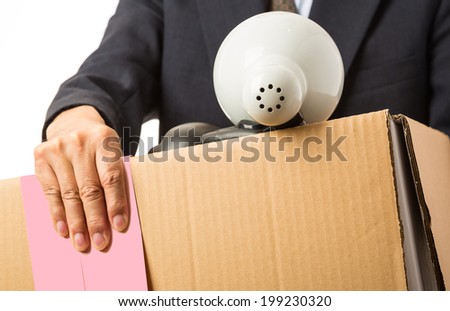 Asian man with a moving box and pink slip