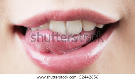 a smiling mouth of an attractive lady
