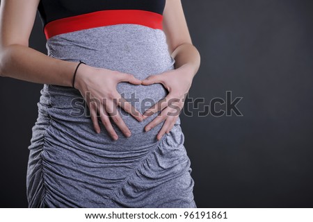 pregnant woman tummy; pregnancy concepts