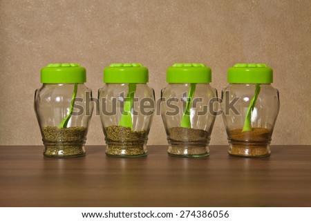 Closed glass jars kitchen storage spices