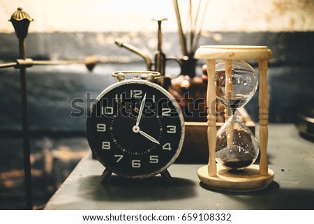 Hourglass and old vintage clock, Sand clock