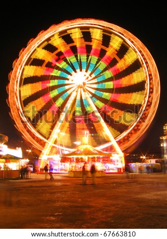 big wheel in motion at night