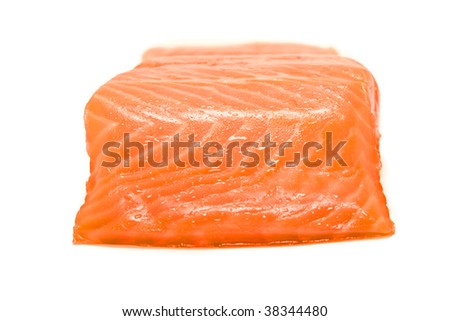 Slice of appetizing red fish on a white background