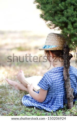 [Obrazek: stock-photo-little-girl-reading-a-book-i...206924.jpg]