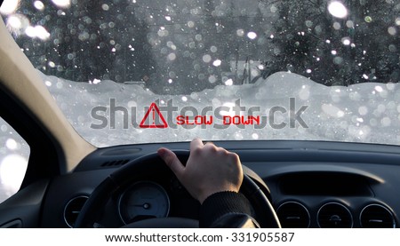 Technology displays a warning on windshield about the bad conditions of the road