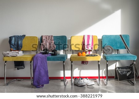 Interior sports gym concept  sport shoes, dumbbell, sport bag and towels - Locker room