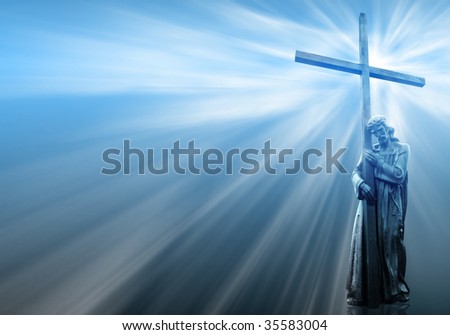 jesus holding a cross on blue background with white rays