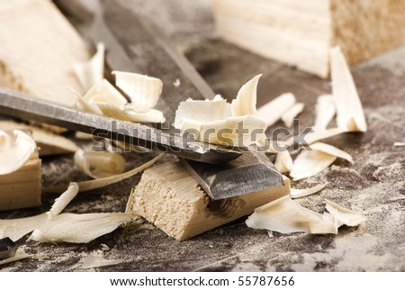 Vintage woodworking tools on dirty workbench , closeup - stock photo
