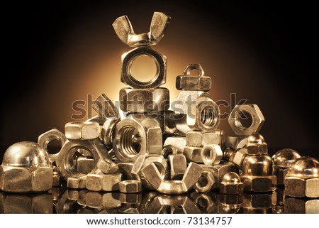 Various types of metal nuts.