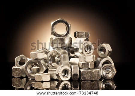 Various types of metal nuts.