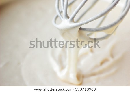 Mixing Batter or dough for banana cake or muffin or pancake. Close up, soft focus.