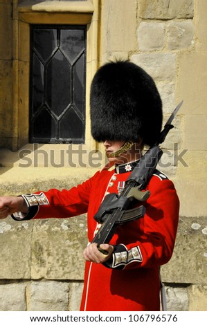 LONDON - ENGLAND JUNE 02:Queen\'s Guard - Tower of London on June 02 2012. The Queen\'s Guard is the contingents of infantry and cavalry soldiers charged with guarding the official royal residences.