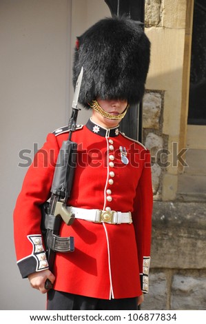 LONDON - JUNE 02:Queen\'s Guard - Tower of London on June 02 2012. The Queen\'s Guard is the contingents of infantry and cavalry soldiers charged with guarding the official royal residences.