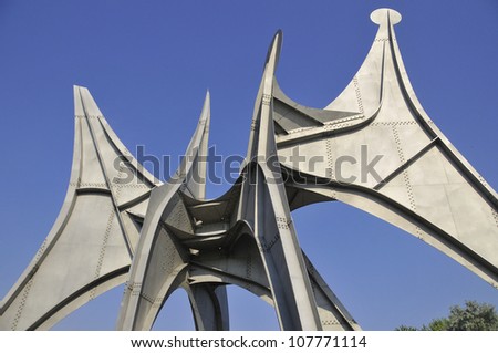 MONTREAL,CANADA - JUL 15:The Alexander Calder sculpture L\'Homme French for Man is a large-scale outdoor sculpture on  JUL 15 2012 in Parc Jean-Drapeau, located in Montreal. Made for 1967 World Fair