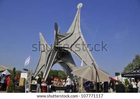 MONTREAL,CANADA - :JUL 15The Alexander Calder sculpture L\'Homme French for Man is a large-scale outdoor sculpture on JUL 15 2012 in Parc Jean-Drapeau, located in Montreal. Made for 1967 World Fair