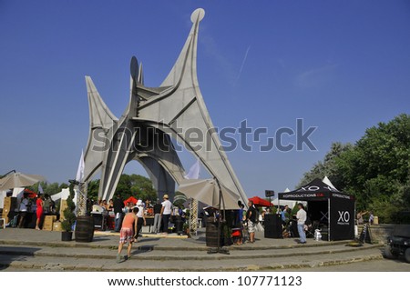 MONTREAL,CANADA - JUL 15:The Alexander Calder sculpture L\'Homme French for Man is a large-scale outdoor sculpture on Jul. 15 2012 in Parc Jean-Drapeau, located in Montreal. Made for 1967 World Fair