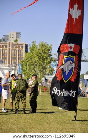 MONTREAL CANADA-SEPT. 02:Montreal military culture festival, SkyHawks, the Canadian Forces Parachute Team on Sept. 02 2012 in Montreal, Canada. The Great Military Montrealers from 1812-2012 exhibition