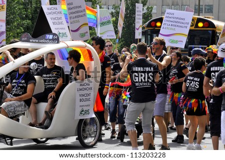 MONTRAL- AUGUST 19: Unidentified participants at the Montreal Pride parade Celebrations festival on August 19, 2012, Montreal, Canada. This event has a mandate to involve, educate and entertain