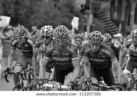 MONTREAL, CANADA-SEPTEMBER 09: A group of cyclists in action at 2012 UCI cycling calendar | 2012 Grand Prix Cycliste de Montreal on September 09, 2012 in Montreal, Mount royal climb