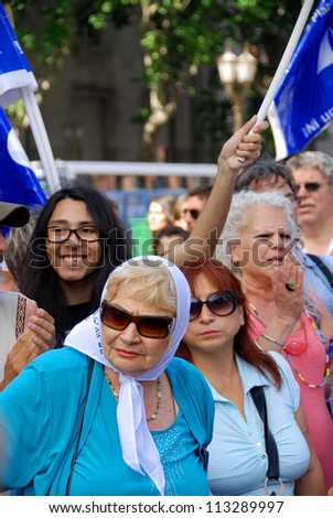 BUENOS AIRES, ARGENTINA - NOV 17: An unidentified woman marches in Buenos Aires, Argentina with \