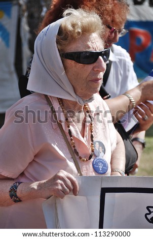 BUENOS AIRES, ARGENTINA - NOV 17: An unidentified woman marches in Buenos Aires, Argentina with \