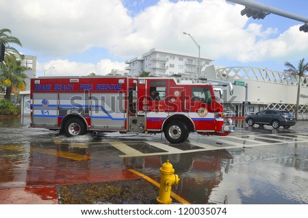 MIAMI - SOUTH BEACH - FLORIDA, OCTOBER 28:  Firefighter truck in Miami South beach Lenox Ave flood aftermath of Hurricane Sandy on october 28 2012 in Miami South Beach.