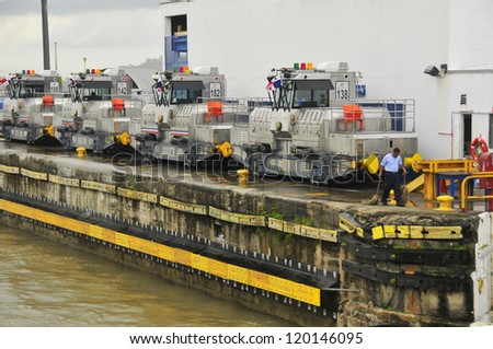 GATUN LOCKS - PANAMA CANAL-NOV. 7: Trains (mules) side Panama Canal.  These mules are used for side-to-side and braking control in the rather narrow locks On nov. 7 2012 in Panama.