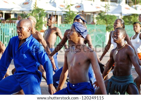 CAPE TOWN, SOUTH AFRICA - MAY 25 : Unidentified young men wears workers clothing, during presentation of soweto street dancing, south african style  on May 25, Cape Town, South Africa.