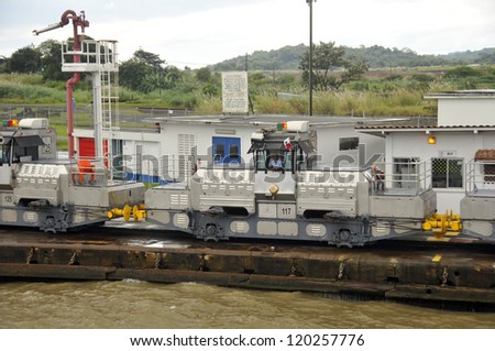 MIRAFLORES LOCKS, PANAMA CANAL-NOV. 7: Trains (mules) side Panama Canal.  These mules are used for side-to-side and braking control in the rather narrow locks On nov. 7 2012 in Panama.