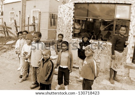 KHAYELITSHA, CAPE TOWN - MAY 22 : unidentified group of young children play on a street of Khayelitsha township, on May 22, 2007, Cape Town, South Africa Khayelitsha is township in Western Cape, SA