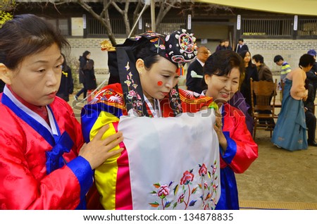SEOUL KOREA APRIL 7: Wedding In Korean tradition, a bride makes two bows, and a bridegroom makes once, which represent the harmony between Yin and Yang. On april 7 2013 in Seoul Korea.