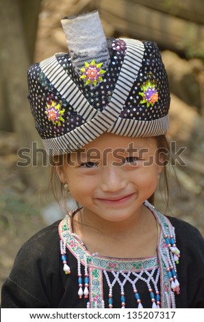 Luang Prabang Laos March 29: Portrait Of Unidentified Young Girl Of Hmong Tribe On March 29 2013 In Luang Prabang Laos. The Hmong An Asian Ethnic Group From The Mountainous Regions.