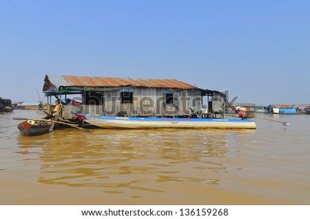 TONLE SAP CAMBODIA LAKE MARCH 31: Floating house along the Tonle sap River is a combined lake and river system of major importance to Cambodia on march 31 2013 in Tonle Sap Lake Cambodia.