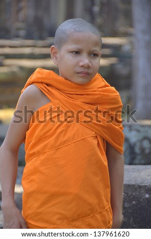 SIEM REAP CAMBODIA MARCH 28: Unidentified monk posing on march 28 2013 in Siem Reap Cambodia. Buddhism is currently estimated to be the faith of 96% of the Cambodian population.