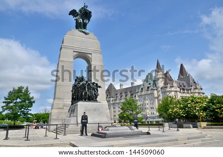 OTTAWA, CANADA - JUNE 30: The National  War Memorial , is a tall granite cenotaph with acreted bronze sculptures, that stands in Confederation Square, June 30, 2013 in Ottawa, Ontario.