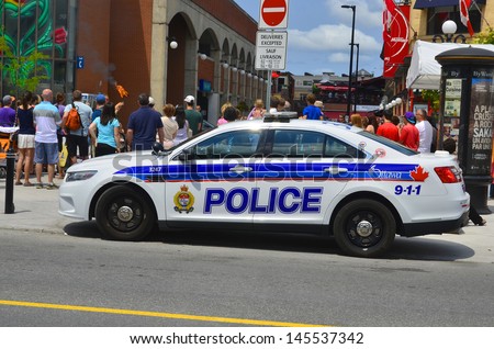 OTTAWA, CANADA, JUNE 30:Car of the Ottawa Police Service (OPS) (Service de police d\'Ottawa in French) serves the City of Ottawa, Ontario, Canada. on june 30 2013 in Ottawa Canada.