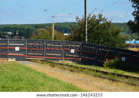 LAC MEGANTIC CANADA JULY 14: Red zone fences after the wost train disaster in the canadian history on july 14 2013 in Lac Megantic Canada. 50 people was killed in this  humanitarian disaster.