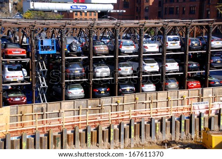 NEW YORK, USA OCTOBER 28: An automated car parking system on October 28, 2013 in Manhattan, New York City, USA. Automatic multi-story automated car park systems are less expensive per parking slot.