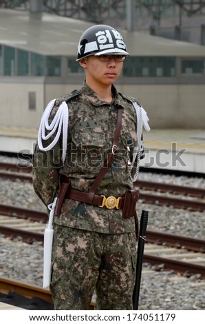 DORASAN, SOUTH KOREA APRIL 7: South Korean Soldier Dorasan train station on april 07 2013 in Dorasan, South Korea. Located in DMZ between the two Koreas, Dorasan Station opened in 2002 still unused