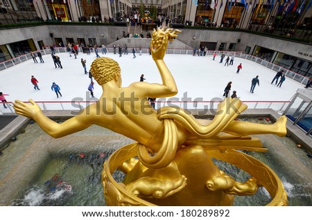 NEW YORK CITY OCT. 02: The golden Prometheus statue at the Rockefeller center on Otc. 02, 2013 in New York, NY. This bronze gilded statue is located at the front of 30 Rockefeller Plaza