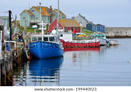 PEGGY\'S COVE NOVA SCOTIA JUNE 6: Typical fisherman houses in Peggy\'s Cove a small rural community located on the eastern shore of St. Margarets Bay in Nova Scotia on june 6 2014.