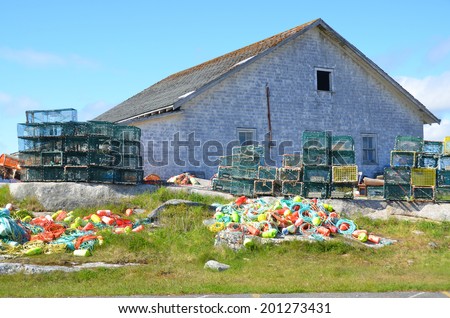 PEGGY\'S COVE NOVA SCOTIA JUNE 6: Typical fisherman shack in Peggy\'s Cove a small rural community located on the eastern shore of St. Margarets Bay in Nova Scotia on june 6 2014.